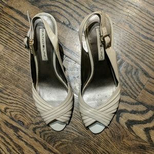 Cream colored peep toe Bandolino heels with strap